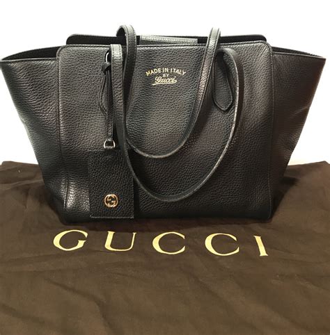 gucci black leather swing trapeze handbag|Gucci handbags for sale.